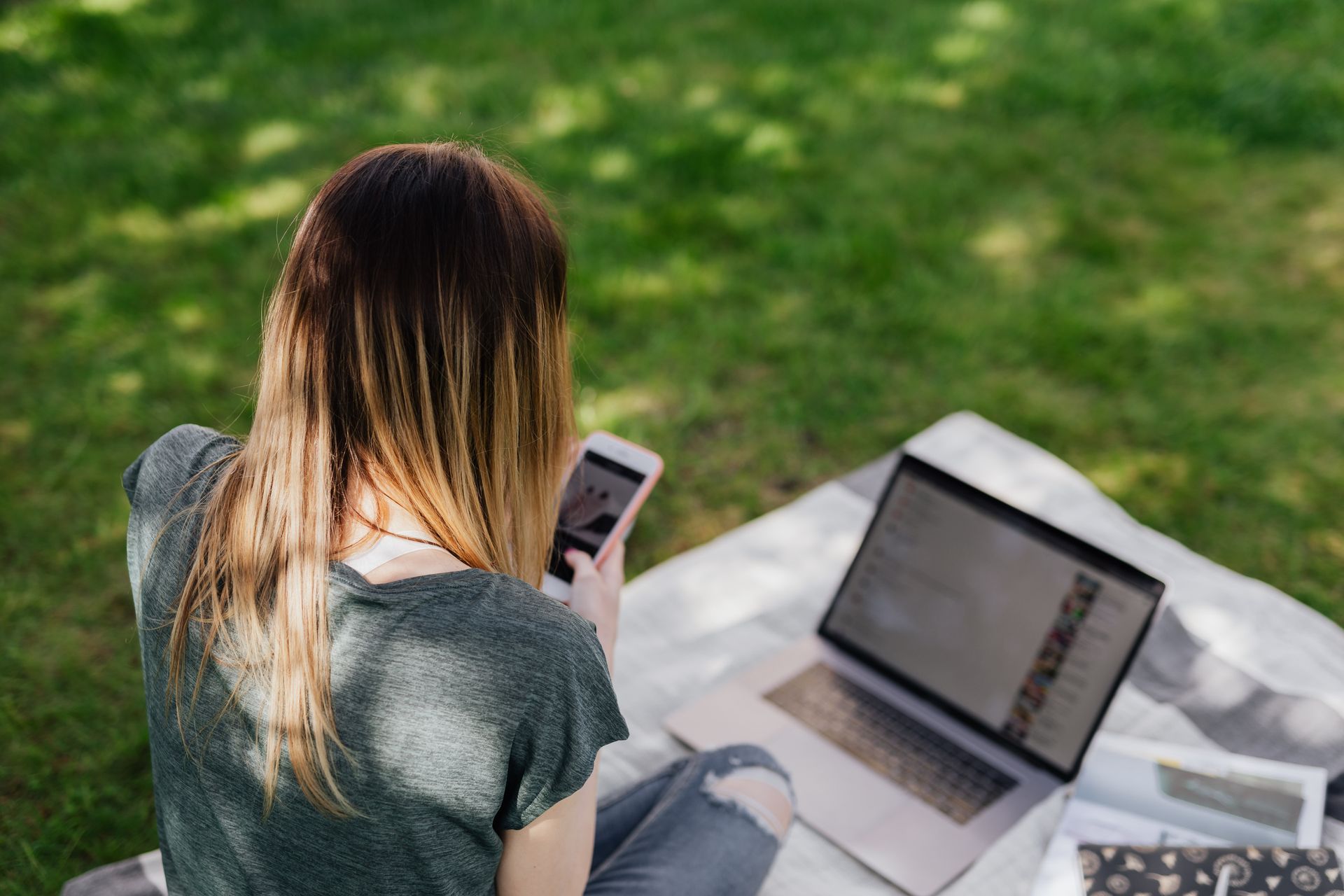 Teenager using a smartphone under Australia's social media minimum age law