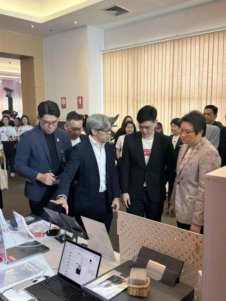 Transformational CEO Ariya Banomyong demonstrating Prompt Pass to Thailand Post leadership and the Deputy Minister of Digital Economy and Society at the 144th anniversary event in Bangkok.