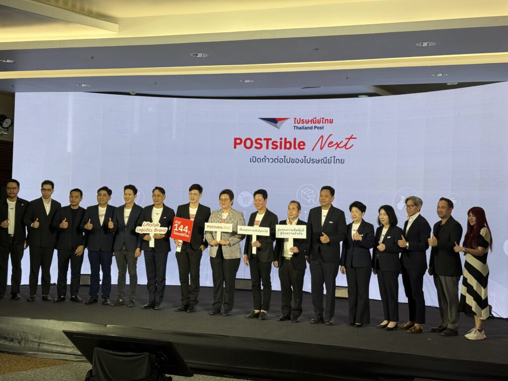 Thailand Post executives, the Ministry of Digital Economy and Society and partners on stage under the POSTsible Next banner at the 144th anniversary, where Prompt Pass was announced.